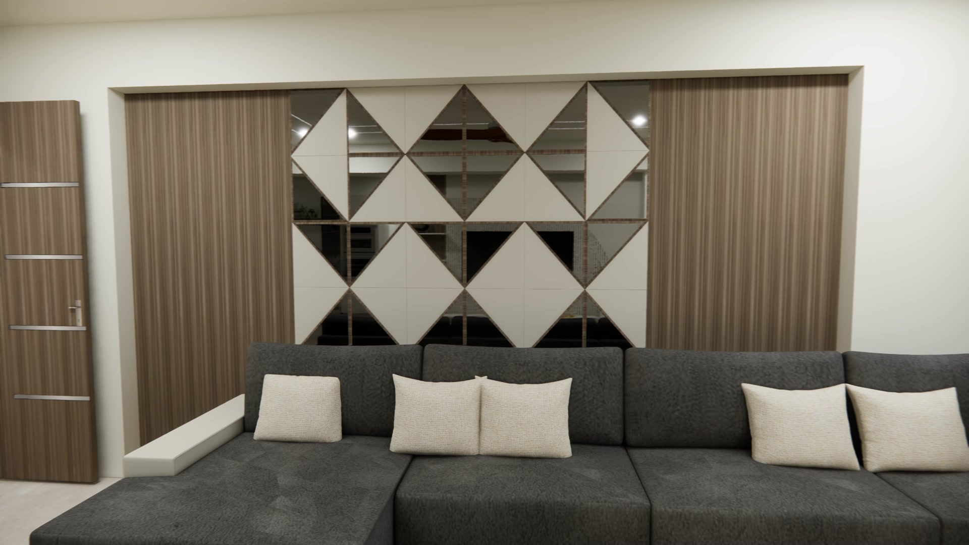 The Spire Penthouse 2 — living room with a mirrored-diamond feature wall
